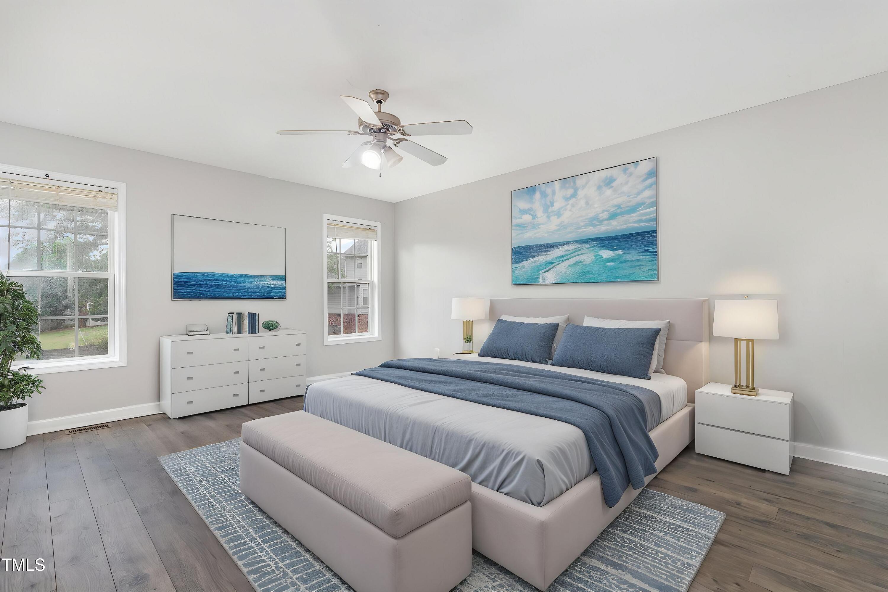 3485 Green Valley Road Fayetteville, NC 28311 - Photo 15 of 28 a spacious bedroom with a bed and a flat screen tv