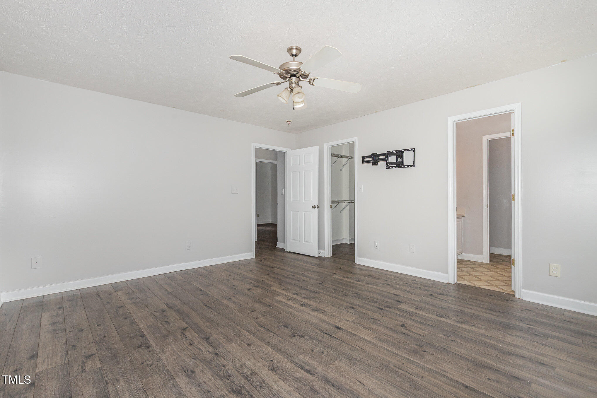 3485 Green Valley Road Fayetteville, NC 28311 - Photo 16 of 28 a view of an empty room with wooden floor