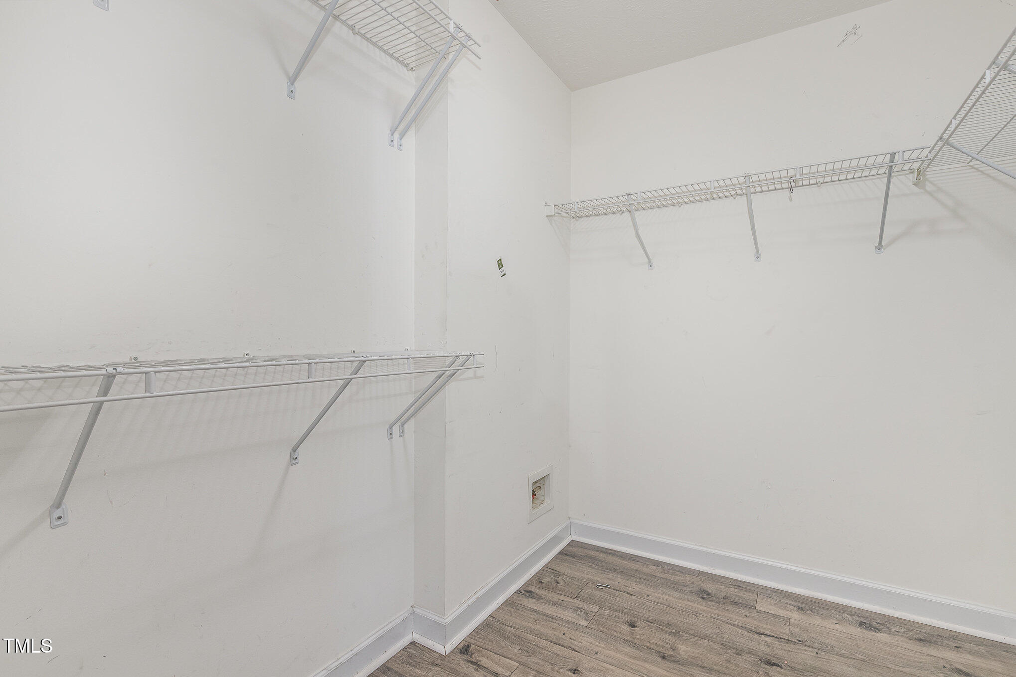 3485 Green Valley Road Fayetteville, NC 28311 - Photo 18 of 28 a view of a room with racks on the wall