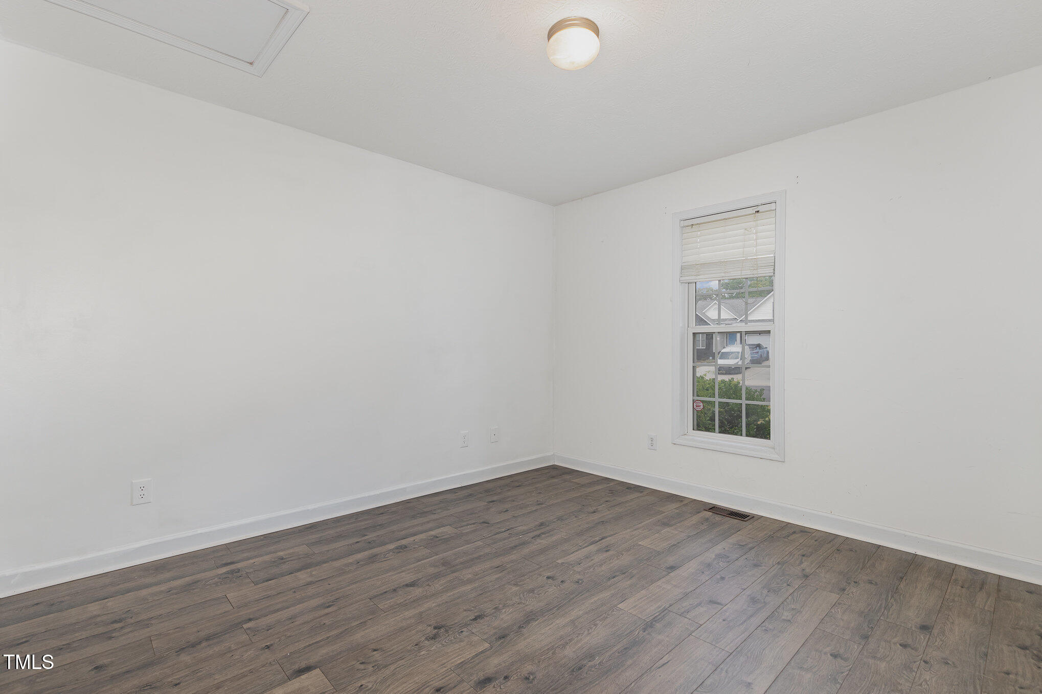 3485 Green Valley Road Fayetteville, NC 28311 - Photo 19 of 28 an empty room with wooden floor and windows