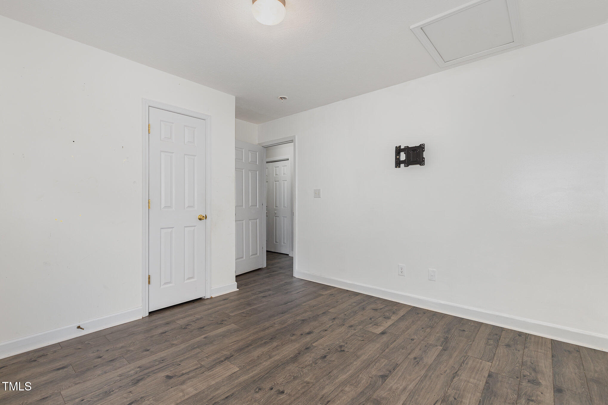 3485 Green Valley Road Fayetteville, NC 28311 - Photo 21 of 28 a view of an empty room with wooden floor
