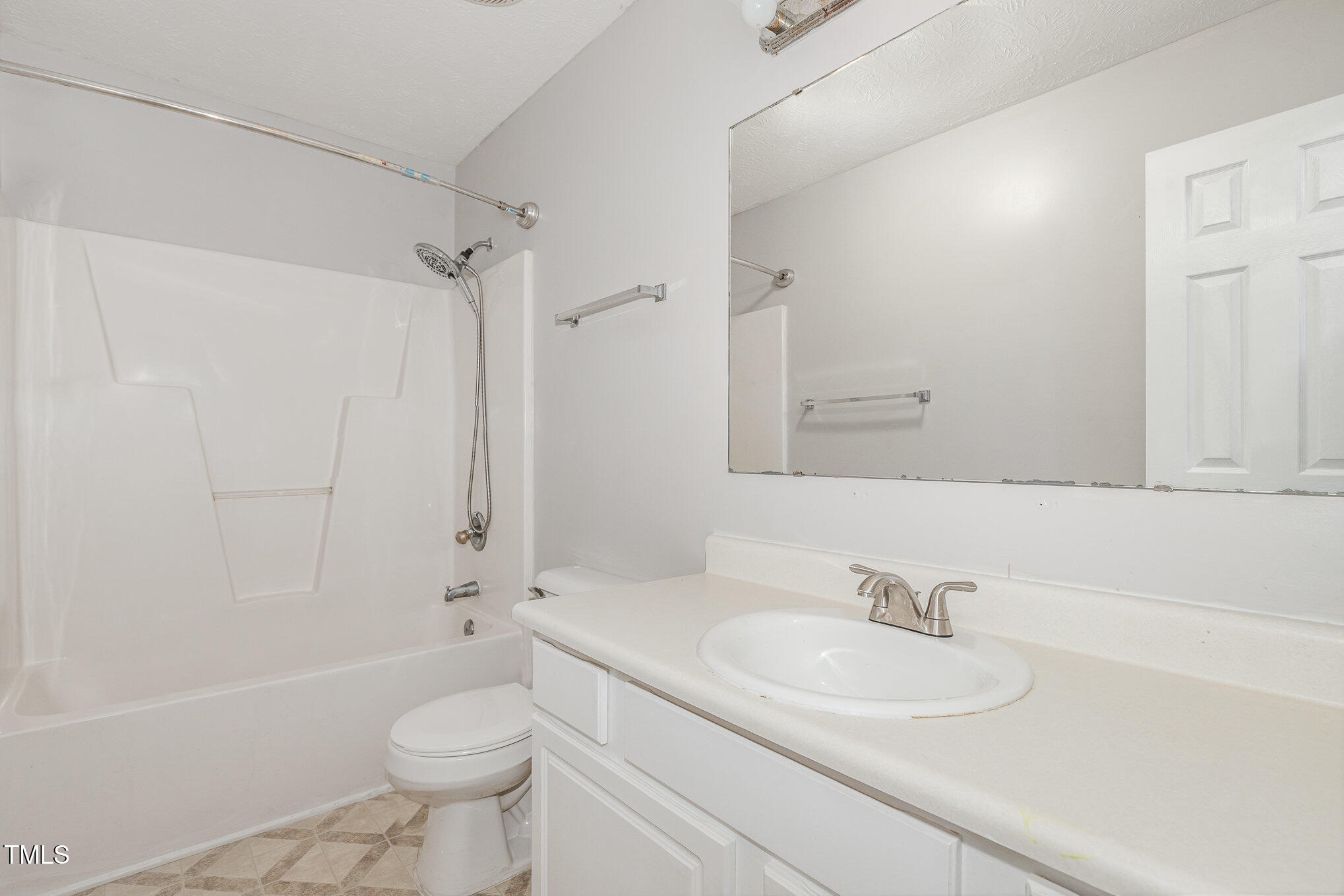 3485 Green Valley Road Fayetteville, NC 28311 - Photo 23 of 28 a bathroom with a sink a toilet and a bathtub