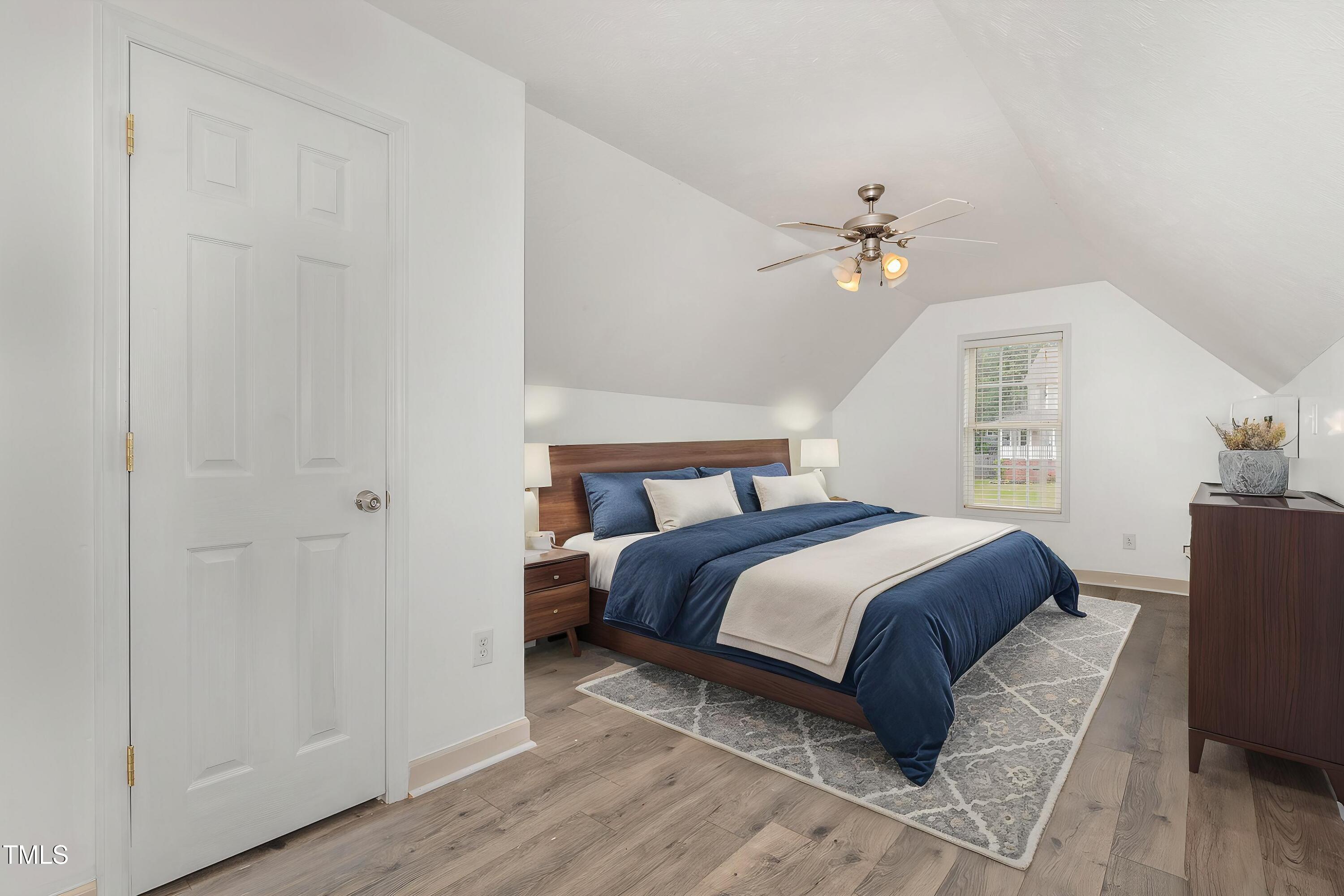 3485 Green Valley Road Fayetteville, NC 28311 - Photo 25 of 28 a bedroom with a bed and a ceiling fan