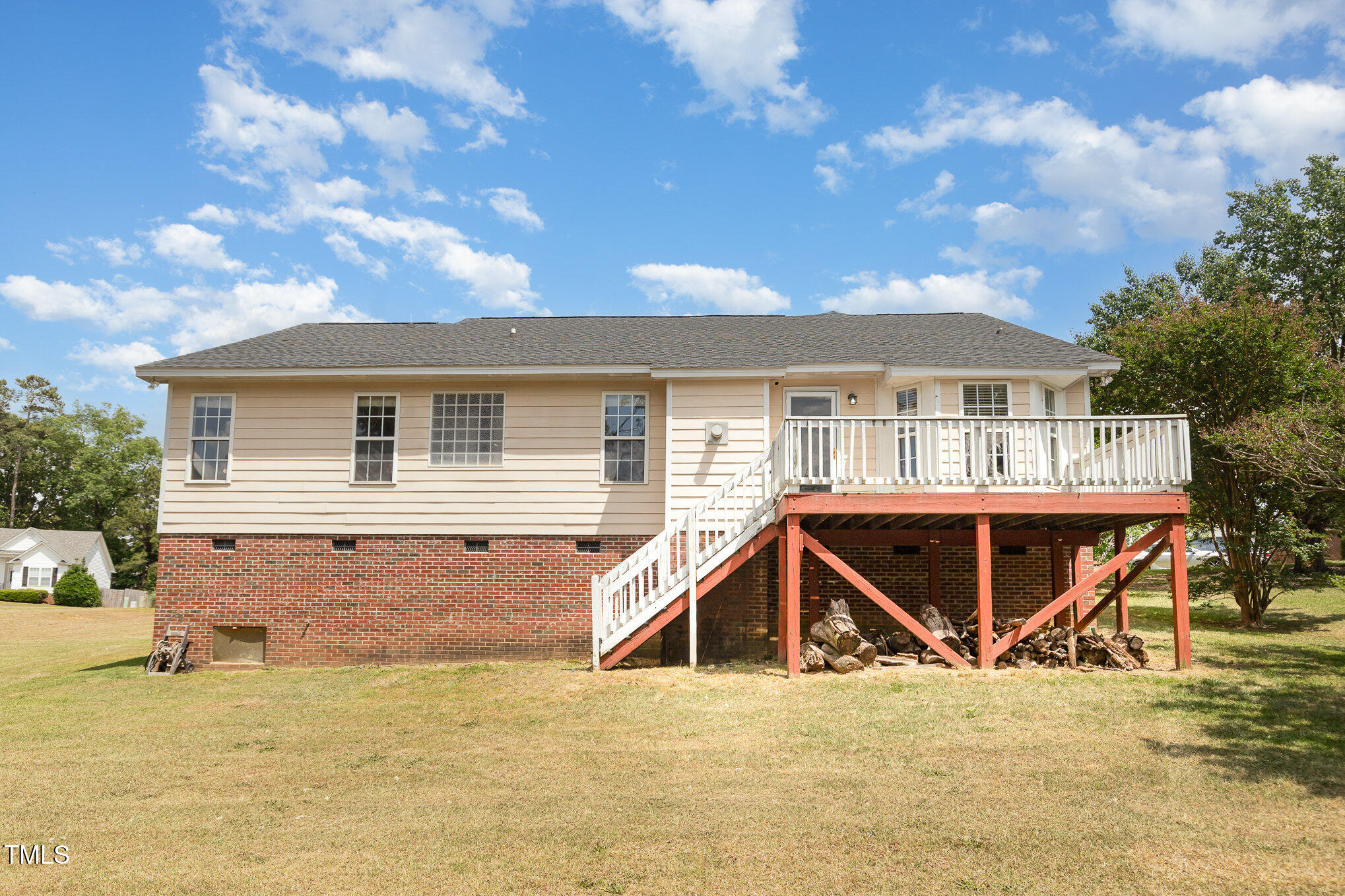 3485 Green Valley Road Fayetteville, NC 28311 - Photo 27 of 28 a view of house with backyard and trees in the background