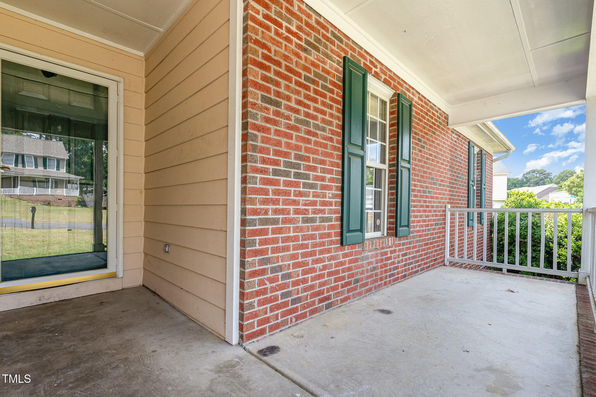 3485 Green Valley Road Fayetteville, NC 28311 - Photo 2 of 28 a view of a porch with a bench