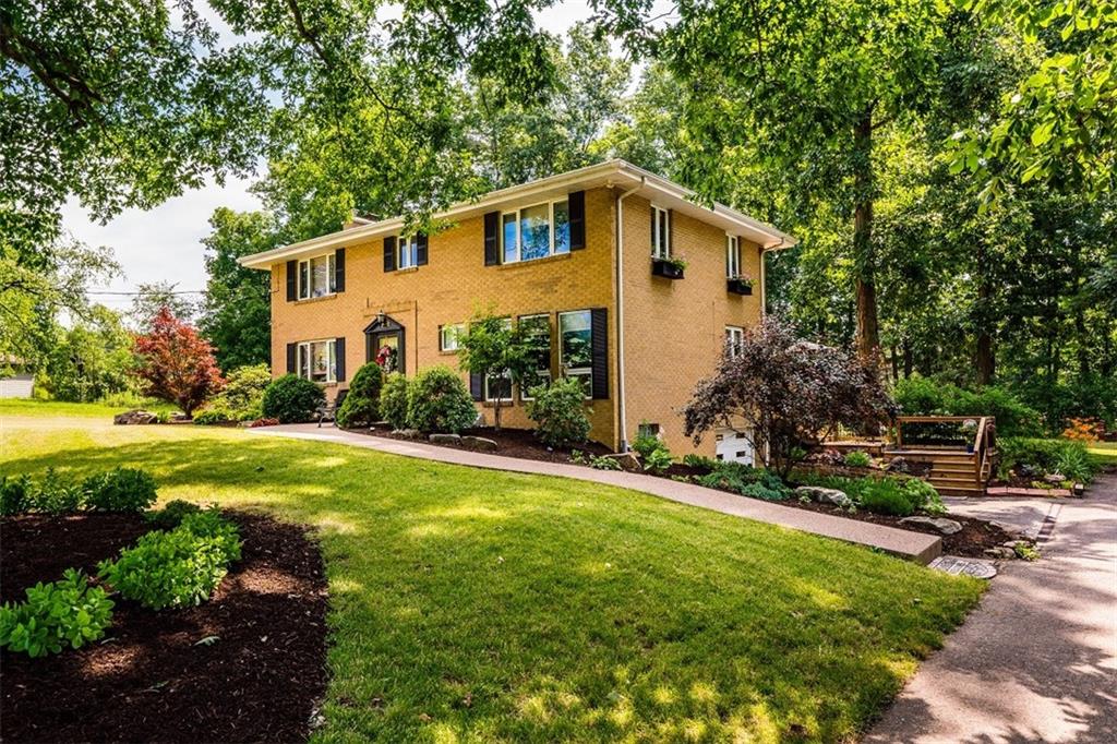 721 Rustic Lodge Road Indiana, PA 15701 - Photo 1 of 25 a view of a house with backyard and garden