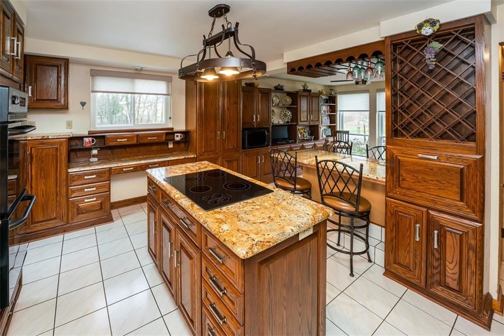 721 Rustic Lodge Road Indiana, PA 15701 - Photo 11 of 25 a kitchen that has a sink and a stove