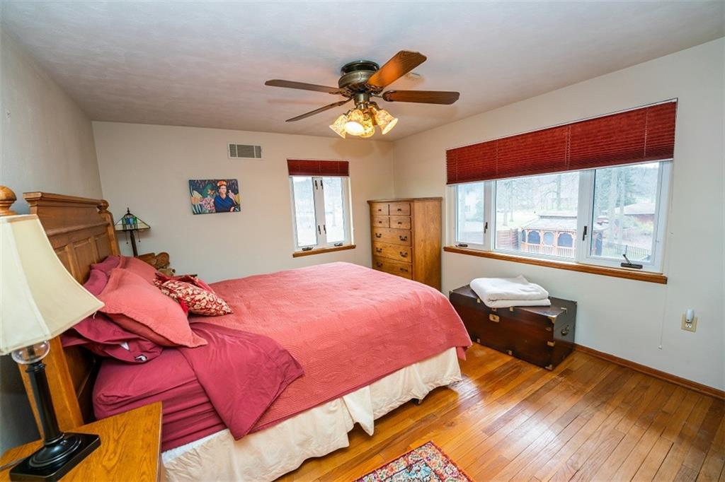 721 Rustic Lodge Road Indiana, PA 15701 - Photo 14 of 25 a bedroom with a bed and a window