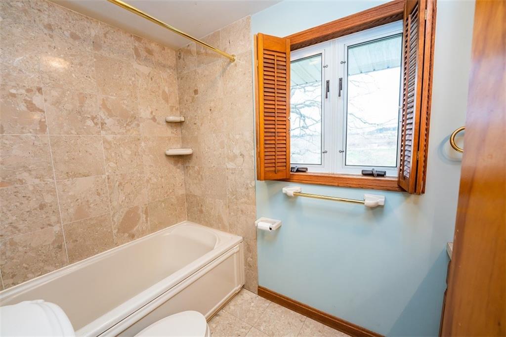721 Rustic Lodge Road Indiana, PA 15701 - Photo 16 of 25 a bathroom with a bathtub and a shower