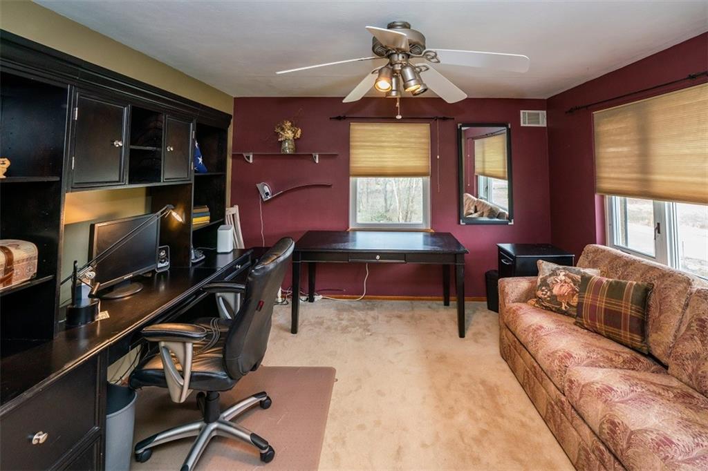 721 Rustic Lodge Road Indiana, PA 15701 - Photo 17 of 25 a living room with furniture gym equipment and a window