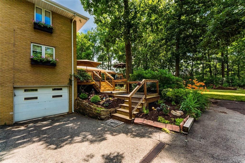 721 Rustic Lodge Road Indiana, PA 15701 - Photo 24 of 25 a view of a patio with wooden fence and a bench