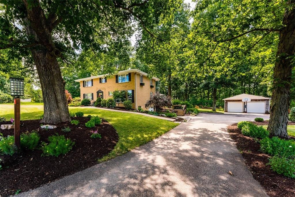 721 Rustic Lodge Road Indiana, PA 15701 - Photo 25 of 25 a front view of a house with a yard and green space