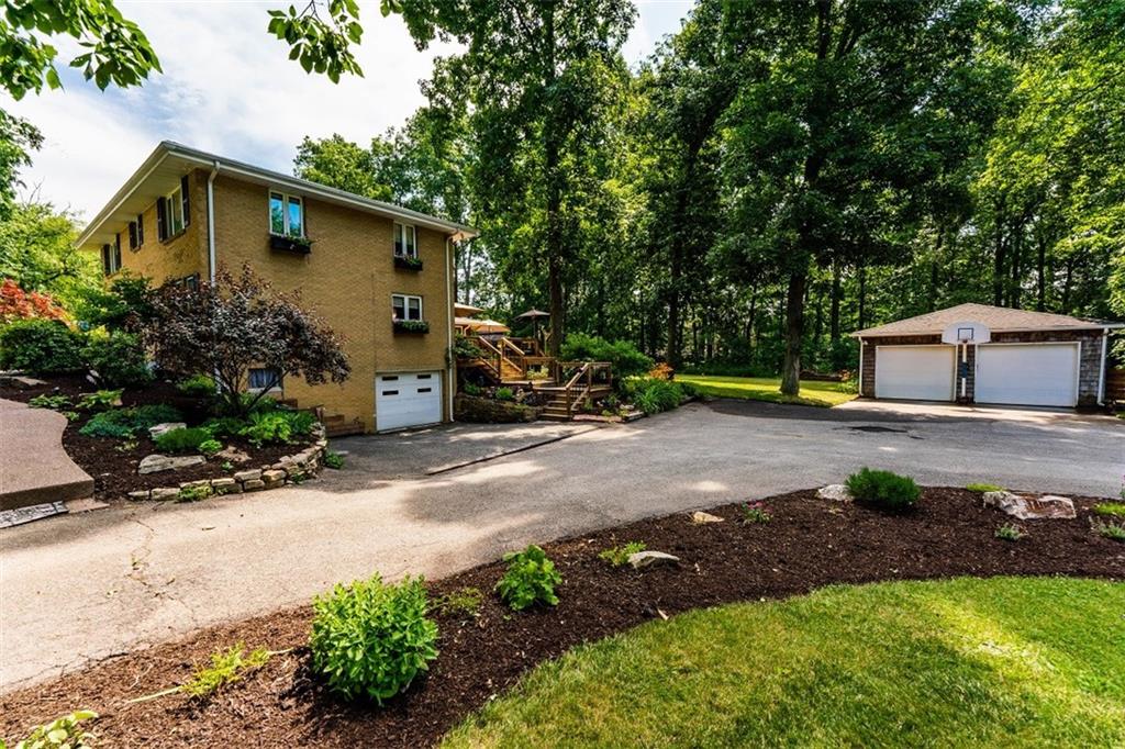 721 Rustic Lodge Road Indiana, PA 15701 - Photo 4 of 25 a view of a house with backyard and sitting area