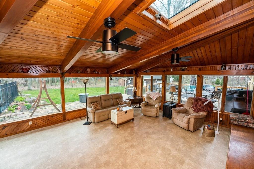 721 Rustic Lodge Road Indiana, PA 15701 - Photo 8 of 25 a living room with furniture and a flat screen tv