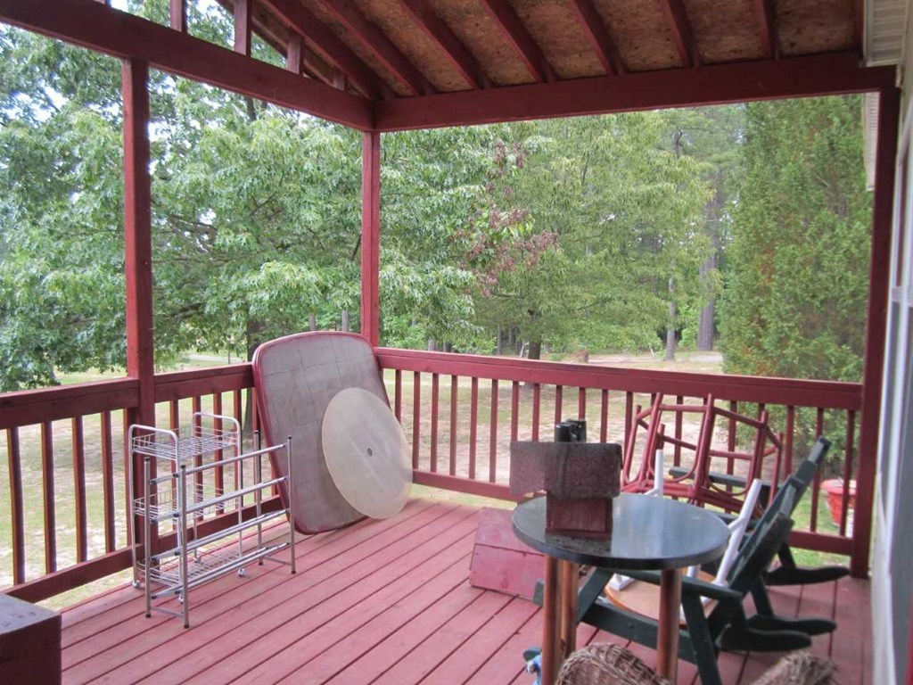 148 5th Road, Unit 20 Haddock, GA 31033 - Photo 2 of 12 a view of a two chairs in the deck