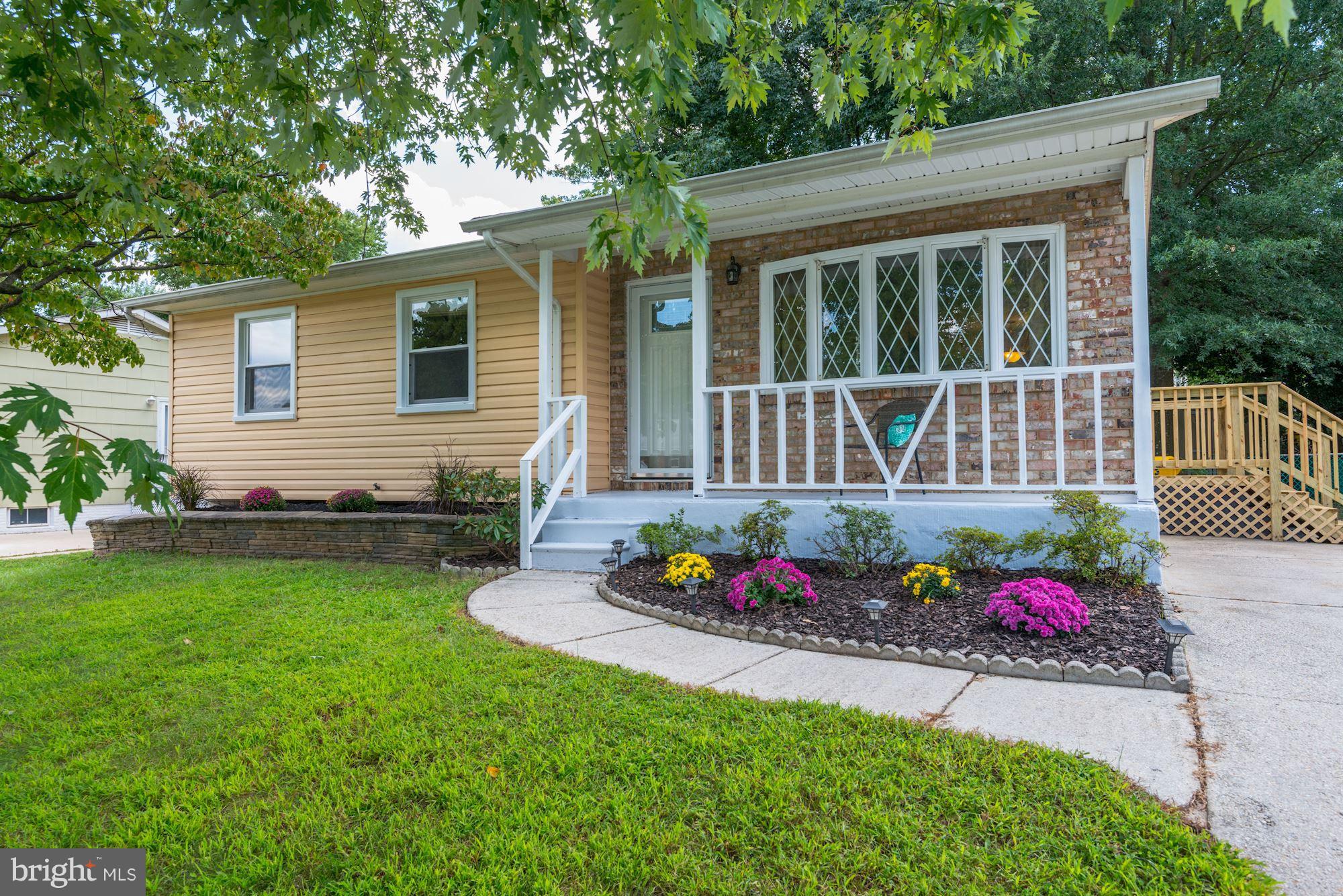 505 Old Mill Road Millersville, MD 21108 - Photo 2 of 28 Colorful garden & inviting front porch