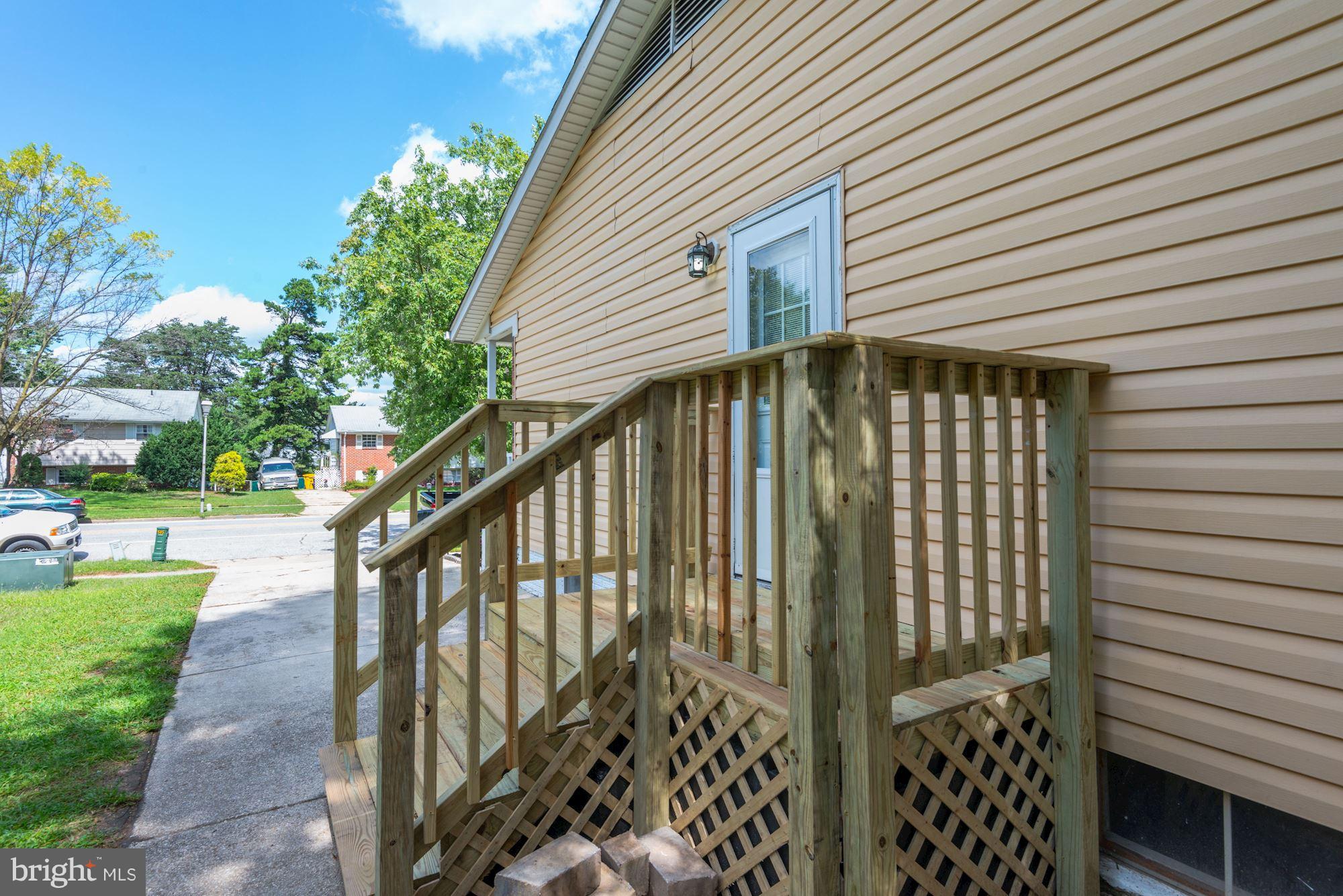 505 Old Mill Road Millersville, MD 21108 - Photo 24 of 28 New side deck from driveway into Kitchen