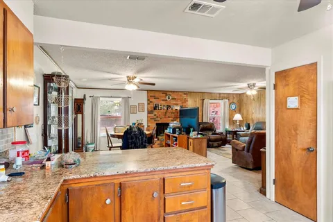 a view of a living room and dining area