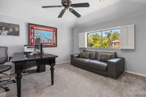 a living room with furniture and a window