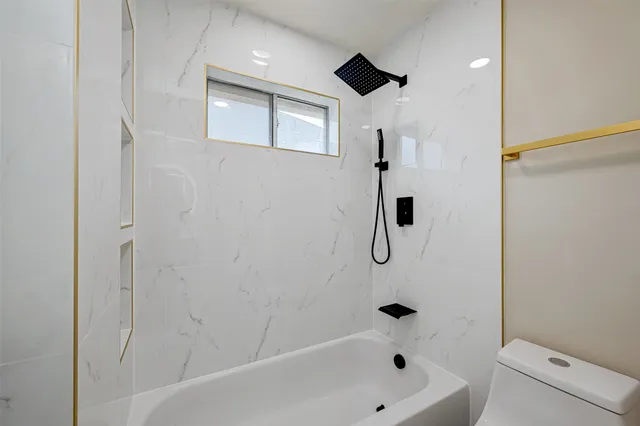 a bathroom with a bathtub