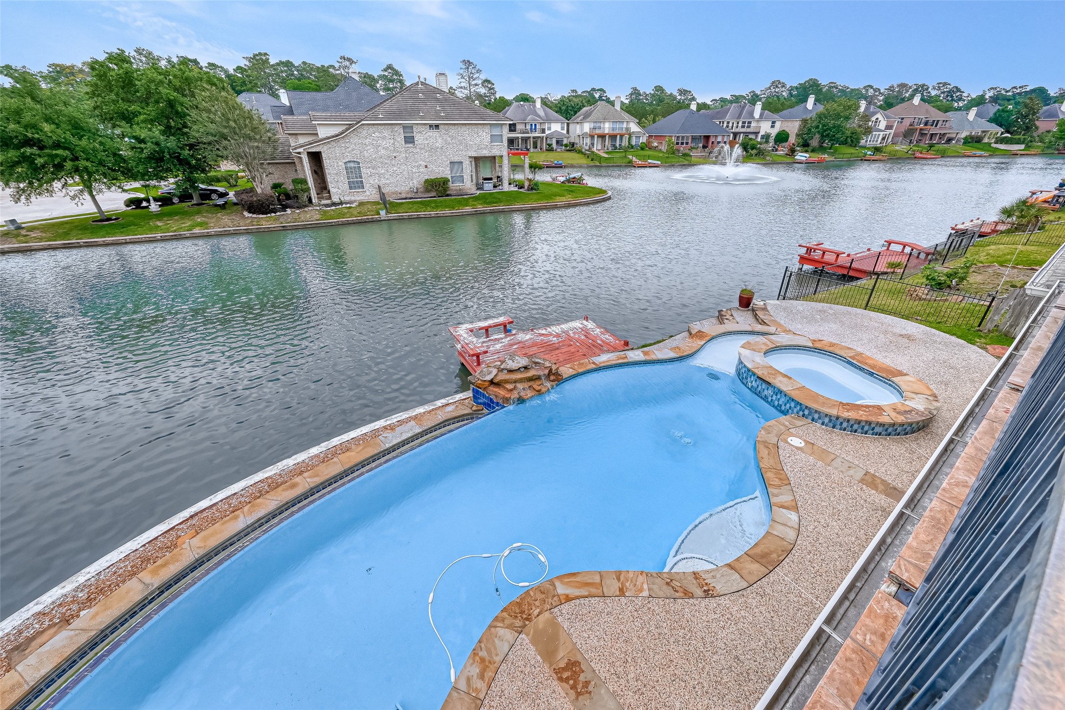 11954 Galentine Point Cypress, TX 77429 - Photo 43 of 48 a view of a lake from a balcony