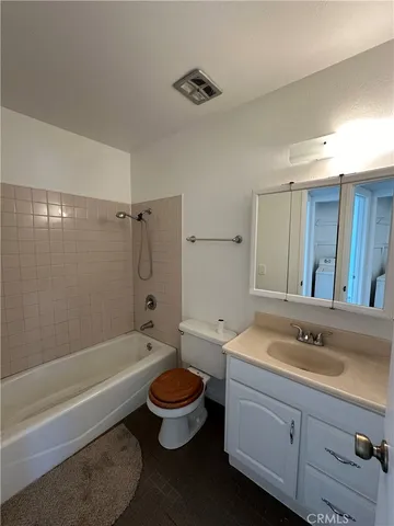 a front view of a house with a large window