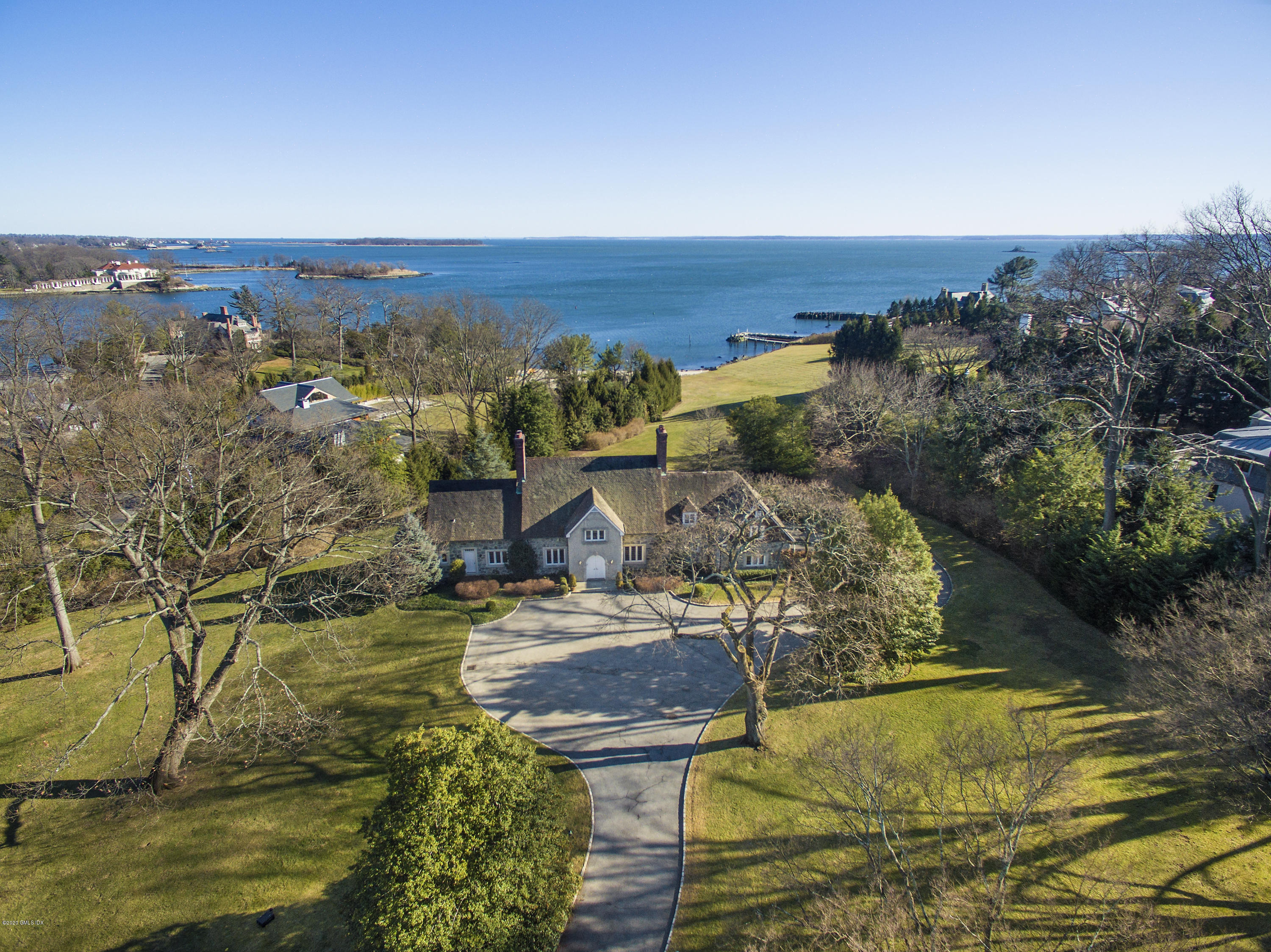 140 Field Point Circle Greenwich, CT 06830 - Photo 1 of 19 an aerial view of residential houses with outdoor space