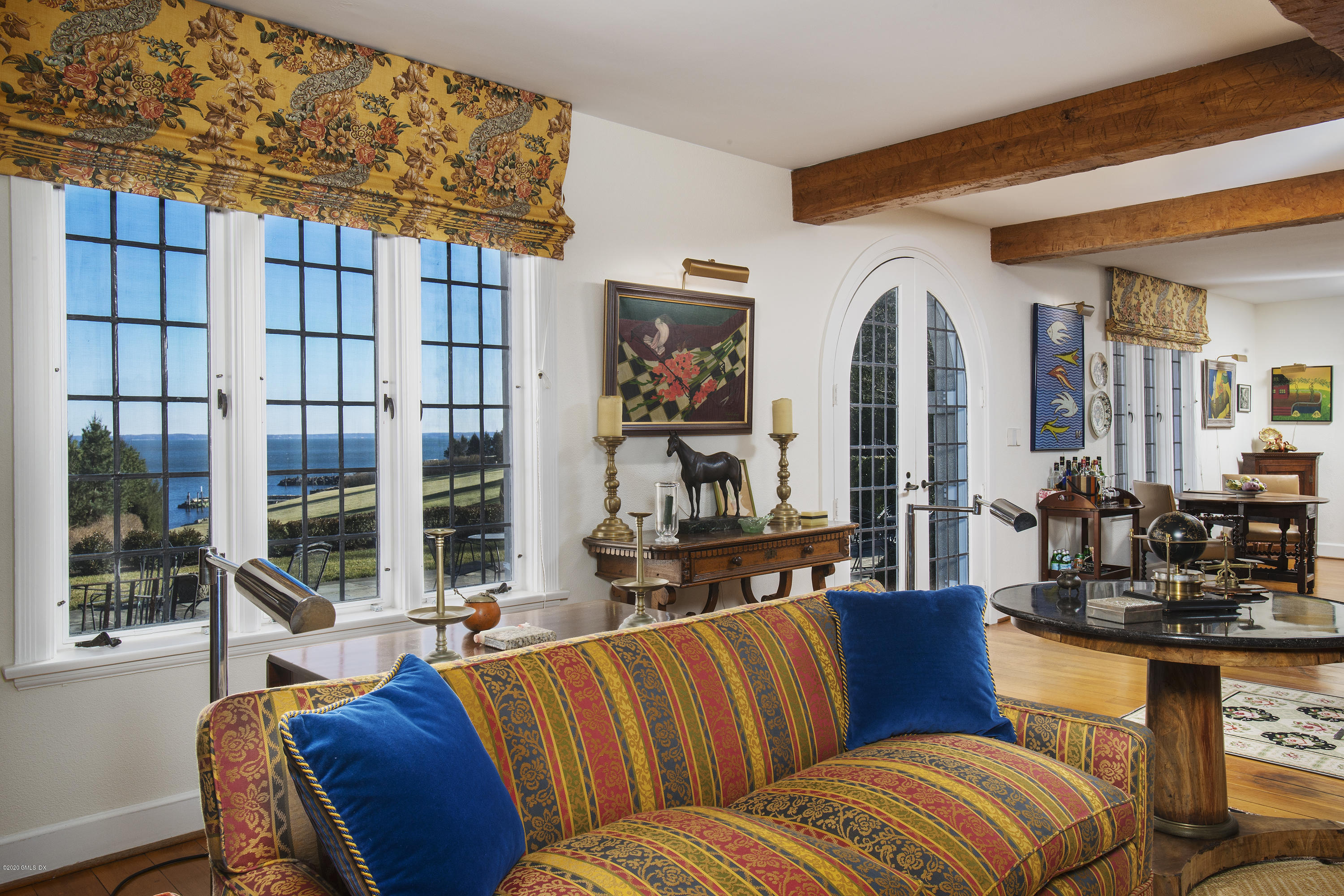 140 Field Point Circle Greenwich, CT 06830 - Photo 13 of 19 a living room with furniture and a large window