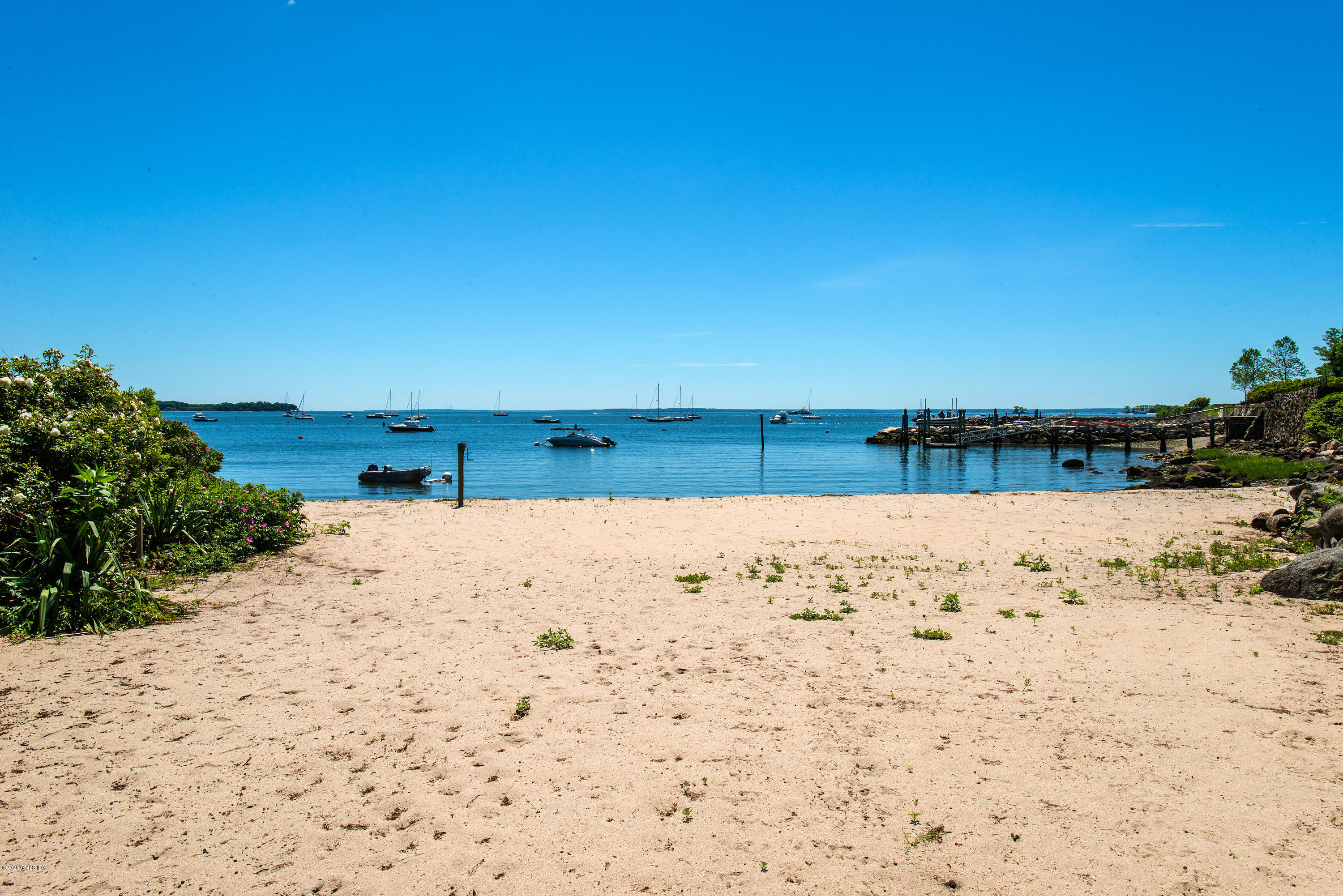 140 Field Point Circle Greenwich, CT 06830 - Photo 17 of 19 a view of ocean beach and mountain
