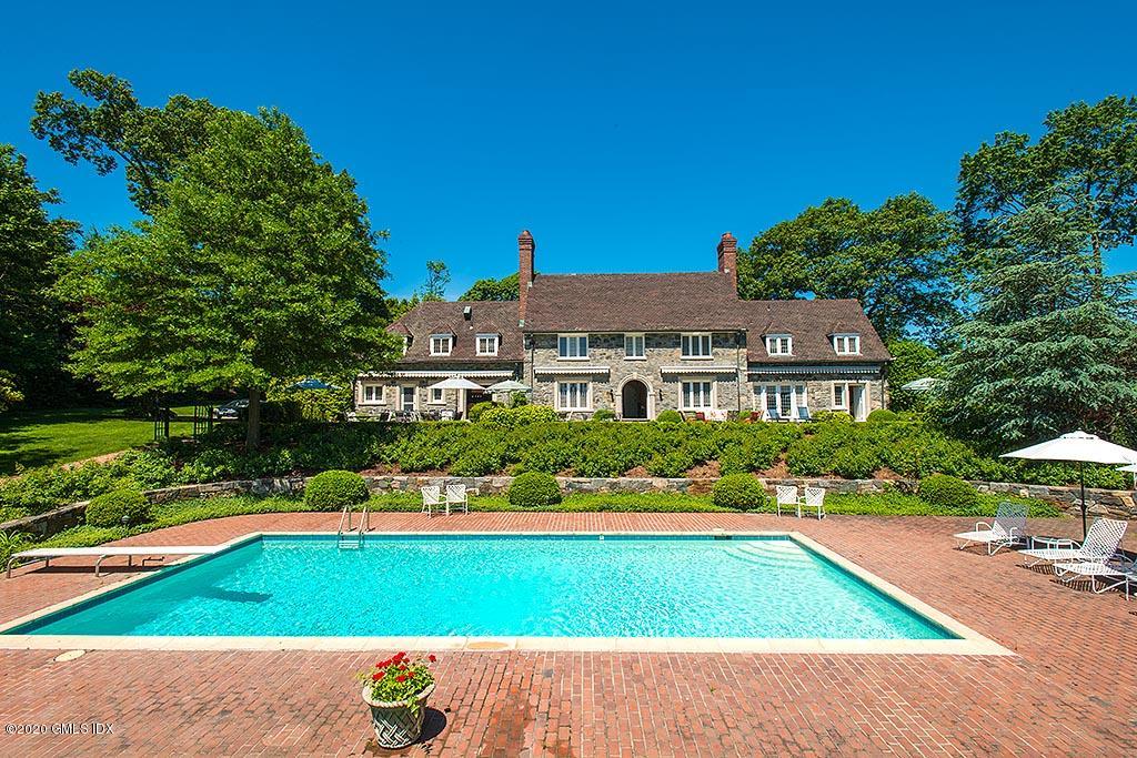 140 Field Point Circle Greenwich, CT 06830 - Photo 18 of 19 a view of building with garden space and street view