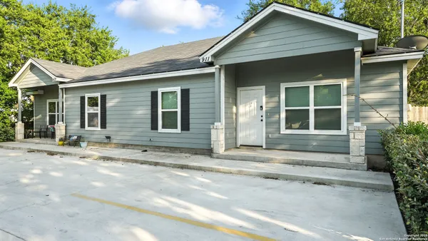 a house with trees in the background