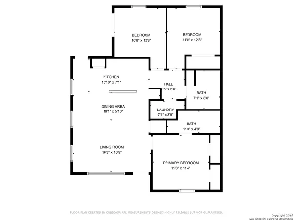 a picture of a bench in front of a wall