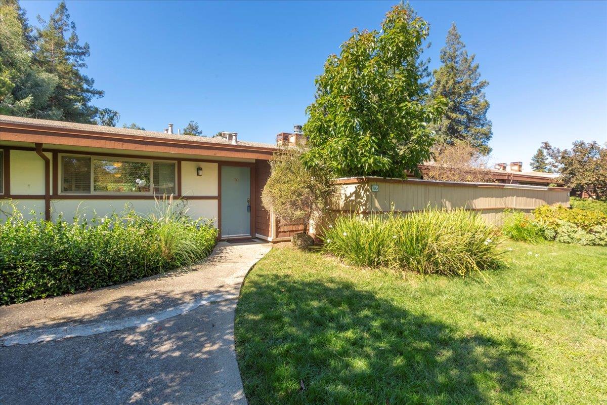 a view of a back yard of the house
