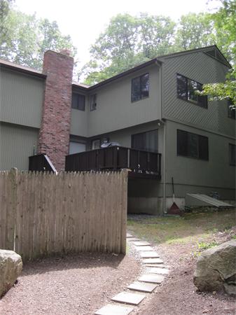 1 Mountain Gate Road, Unit 1 Ashland, MA 01721 - Photo 1 of 13 a front view of a house with a yard