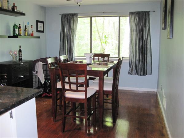 1 Mountain Gate Road, Unit 1 Ashland, MA 01721 - Photo 6 of 13 a view of a dining room with furniture and window