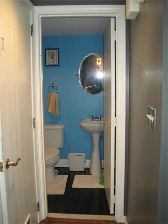 1 Mountain Gate Road, Unit 1 Ashland, MA 01721 - Photo 7 of 13 a bathroom with a toilet and a mirror