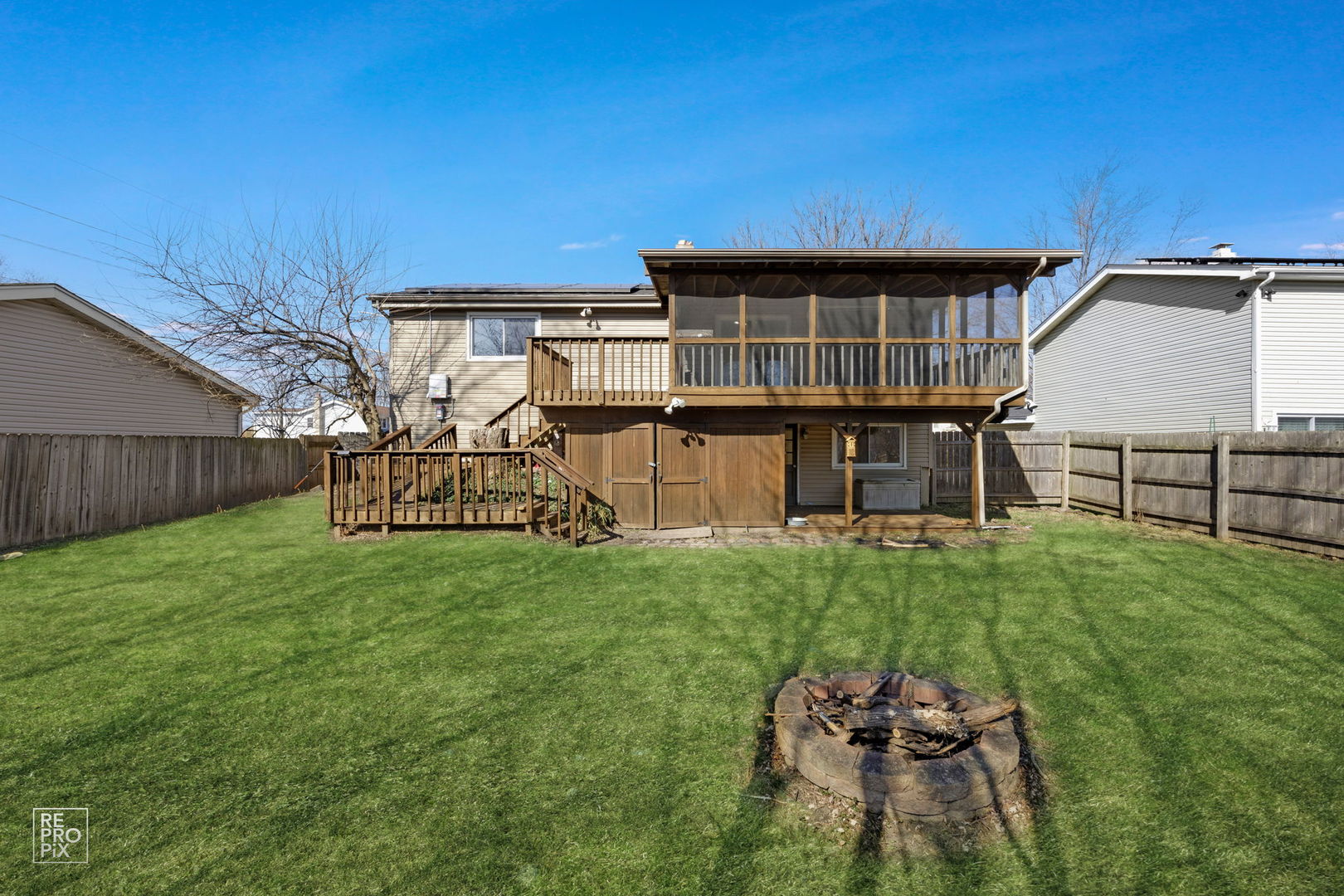 653 West Briarcliff Road Bolingbrook, IL 60440 - Photo 15 of 15 a view of a house with backyard and sitting area