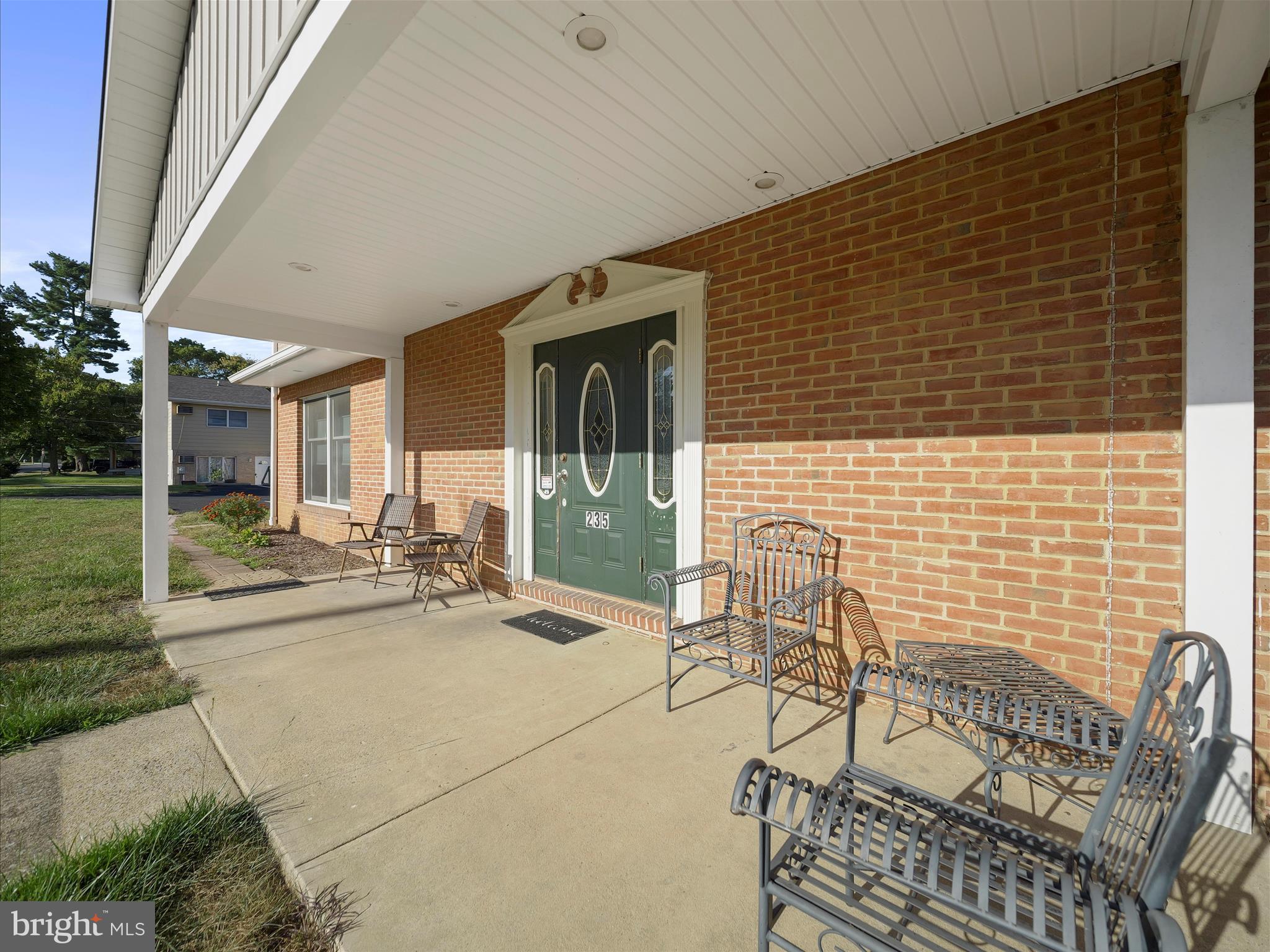 235 South Ridge Avenue, Unit B Greencastle, PA 17225 - Photo 12 of 29 a view of a patio with table and chairs and potted plants