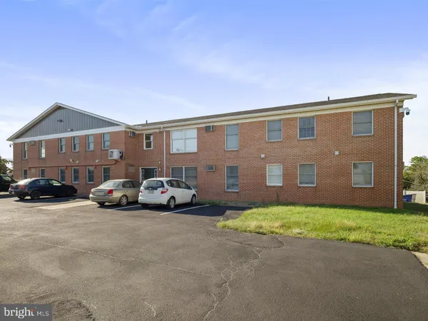 a view of a car in front of house
