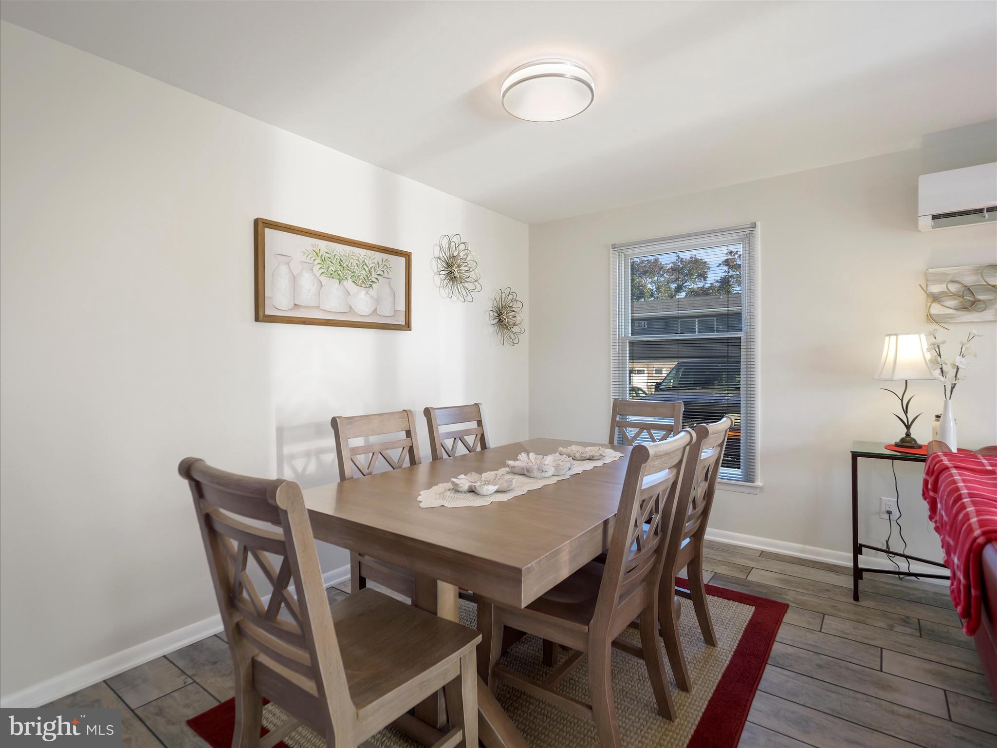 235 South Ridge Avenue, Unit B Greencastle, PA 17225 - Photo 4 of 29 a view of a dining room with furniture and wooden floor