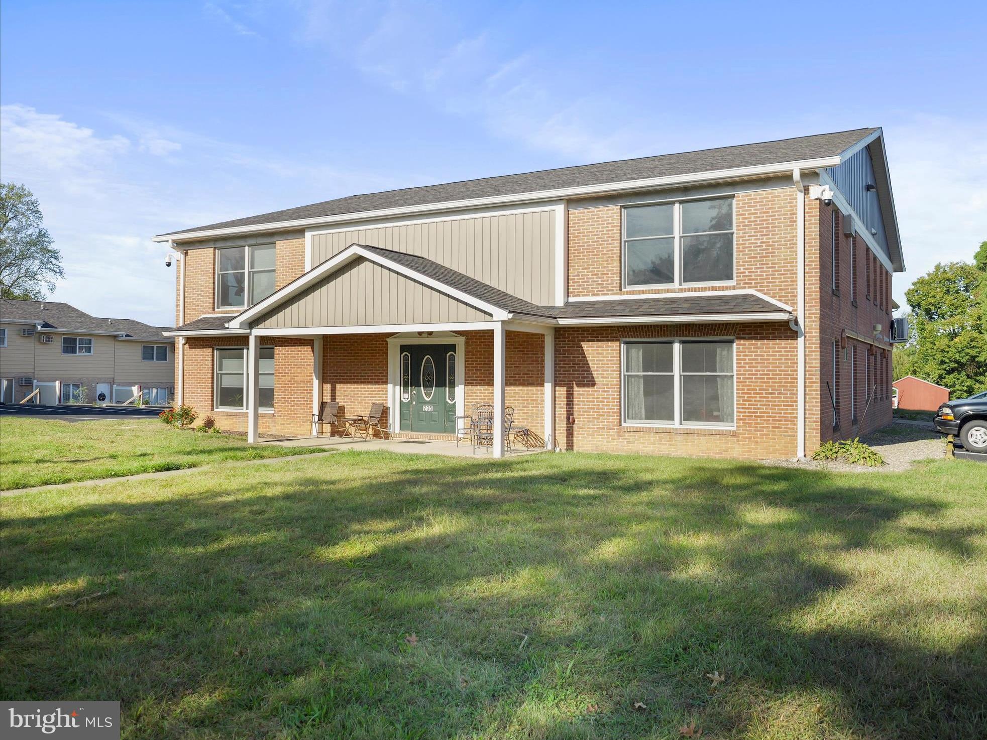 235 South Ridge Avenue, Unit B Greencastle, PA 17225 - Photo 10 of 29 a front view of a house with a garden