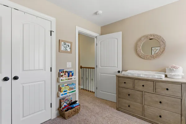 a children room with a dresser