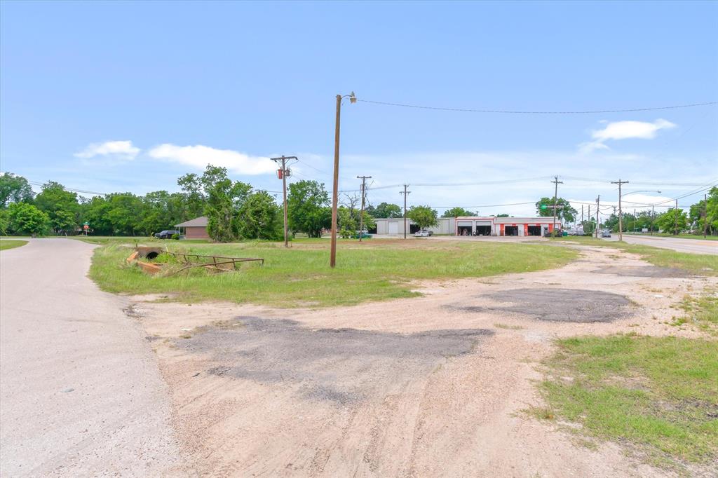 1008 South Virginia Street Terrell, TX 75160 - Photo 16 of 22 a view of a golf course with a play ground