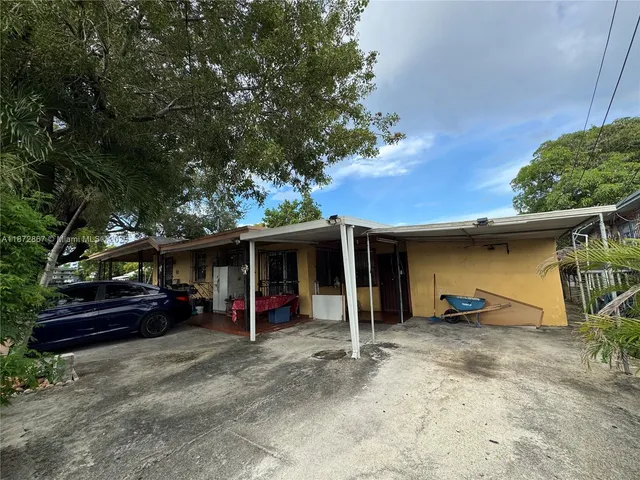 a view of outdoor space yard and garage
