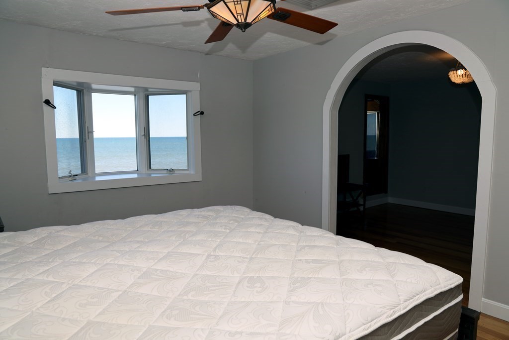 55 Rebecca Road Scituate, MA 02066 - Photo 12 of 27 a bed sitting in a bedroom next to a window