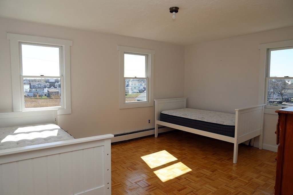 55 Rebecca Road Scituate, MA 02066 - Photo 14 of 27 a bedroom with bed and a window