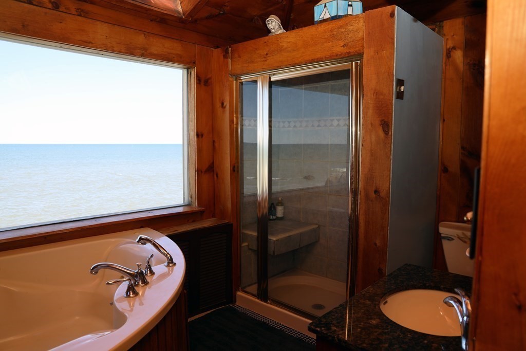 55 Rebecca Road Scituate, MA 02066 - Photo 18 of 27 a bathroom with a toilet and a shower