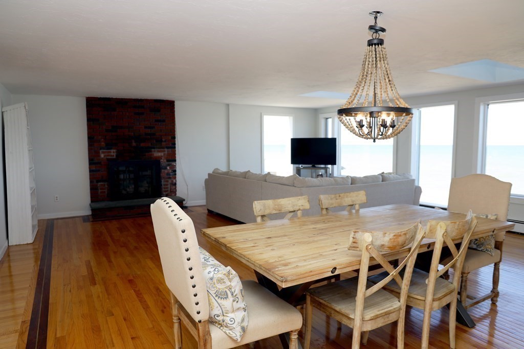 55 Rebecca Road Scituate, MA 02066 - Photo 5 of 27 a view of a dining room with furniture and chandelier