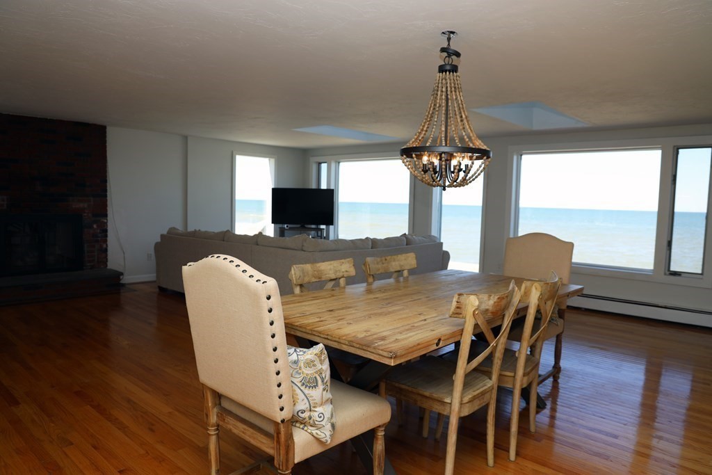 55 Rebecca Road Scituate, MA 02066 - Photo 6 of 27 a view of a dining room with furniture window and wooden floor