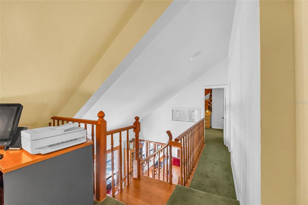 1217 Edgewood Ranch Road Orlando, FL 32835 - Photo 38 of 91 a view of entryway and hall with wooden floor